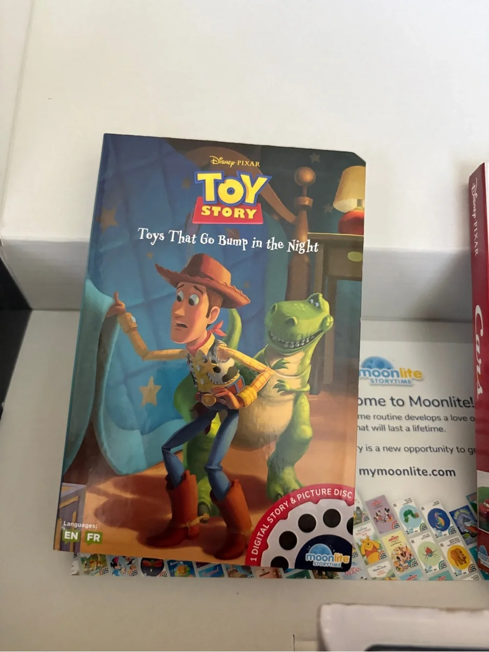 Moonlite Projector with Disney Pixar Story Reels - Blue